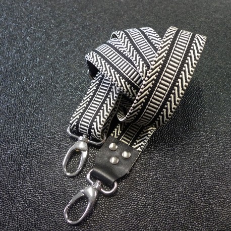 Bandoulière réglable jacquard graphique et cuir véritable